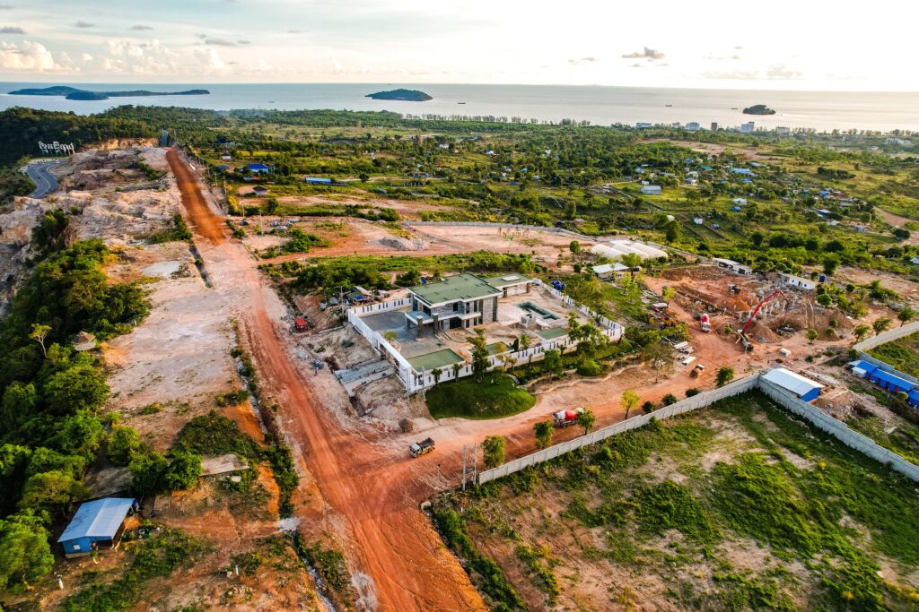  Aerial drone flying over a residential estate construction site mapping land boundaries buy a house in Nigeria