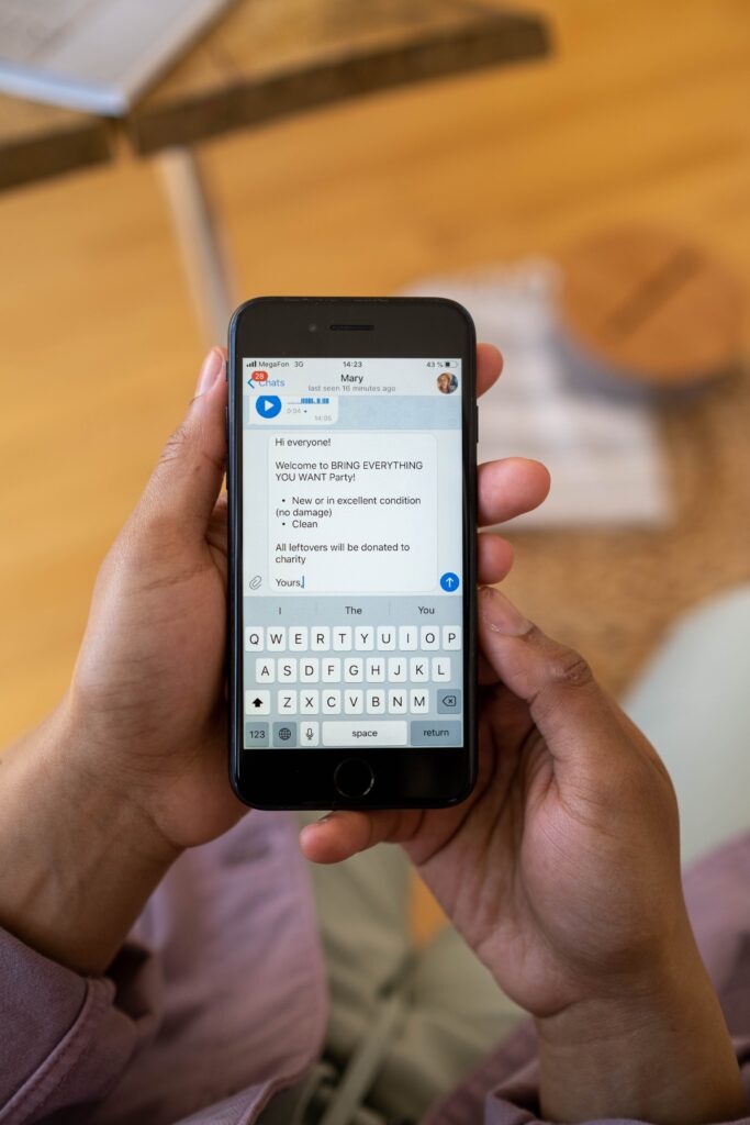 Person using a mobile app to find the best rate send money Nigeria transfers